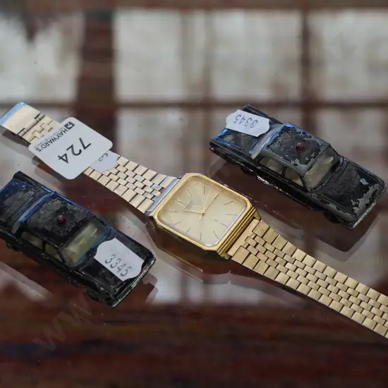 Casio wristwatch, 2 vehicles