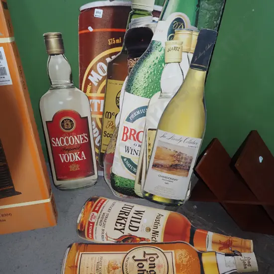 cardboard cut outs of alcoholic beverages