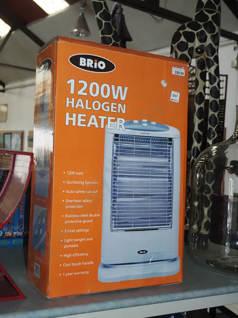 boxed as new 1200w halogen heater Image 1++