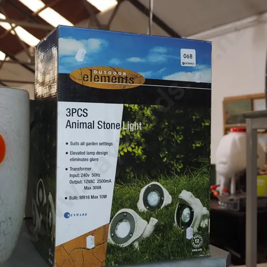 boxed as new 3x animal stone garden lights