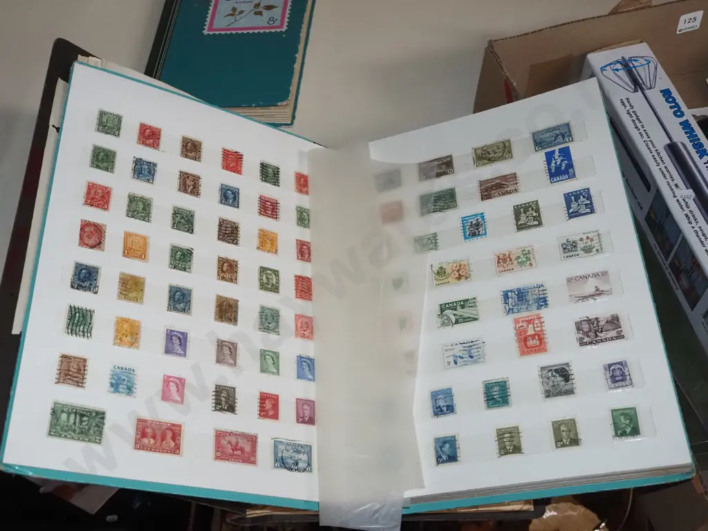 3x stamp albums Image 1++