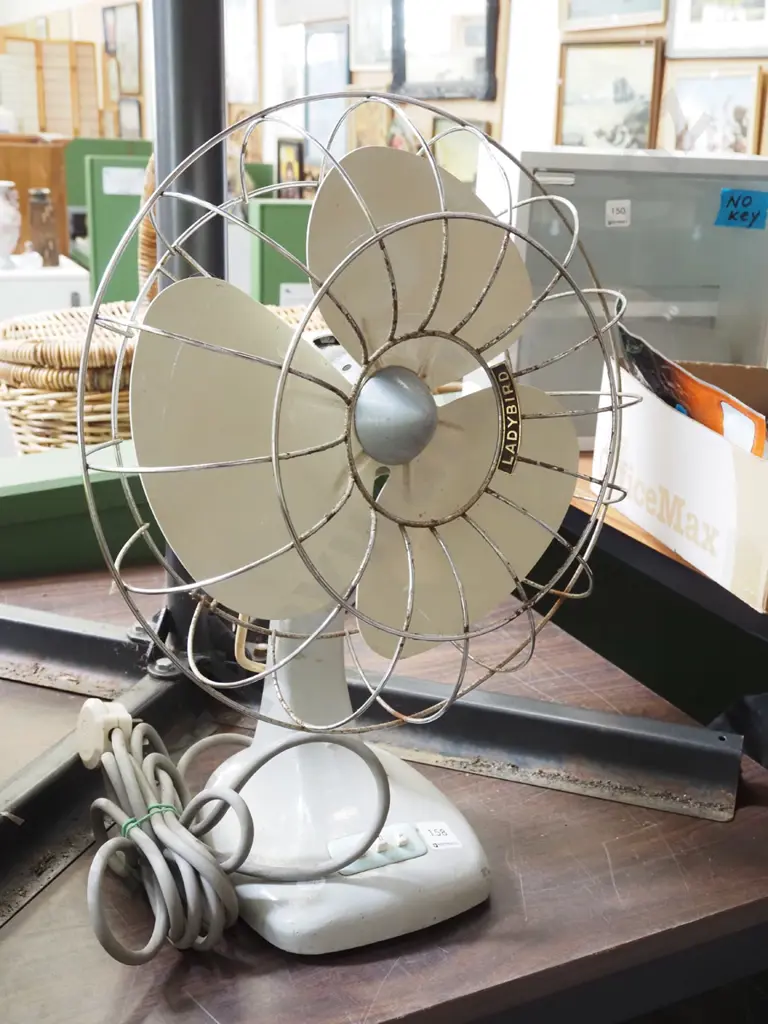 Ladybird tabletop fan - rust to chrome Image 1++