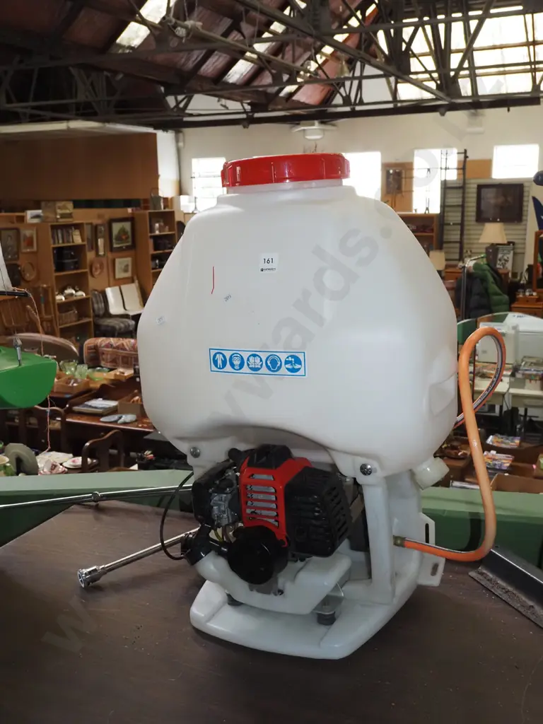 as new 2 stroke powered backback sprayer Image 1++