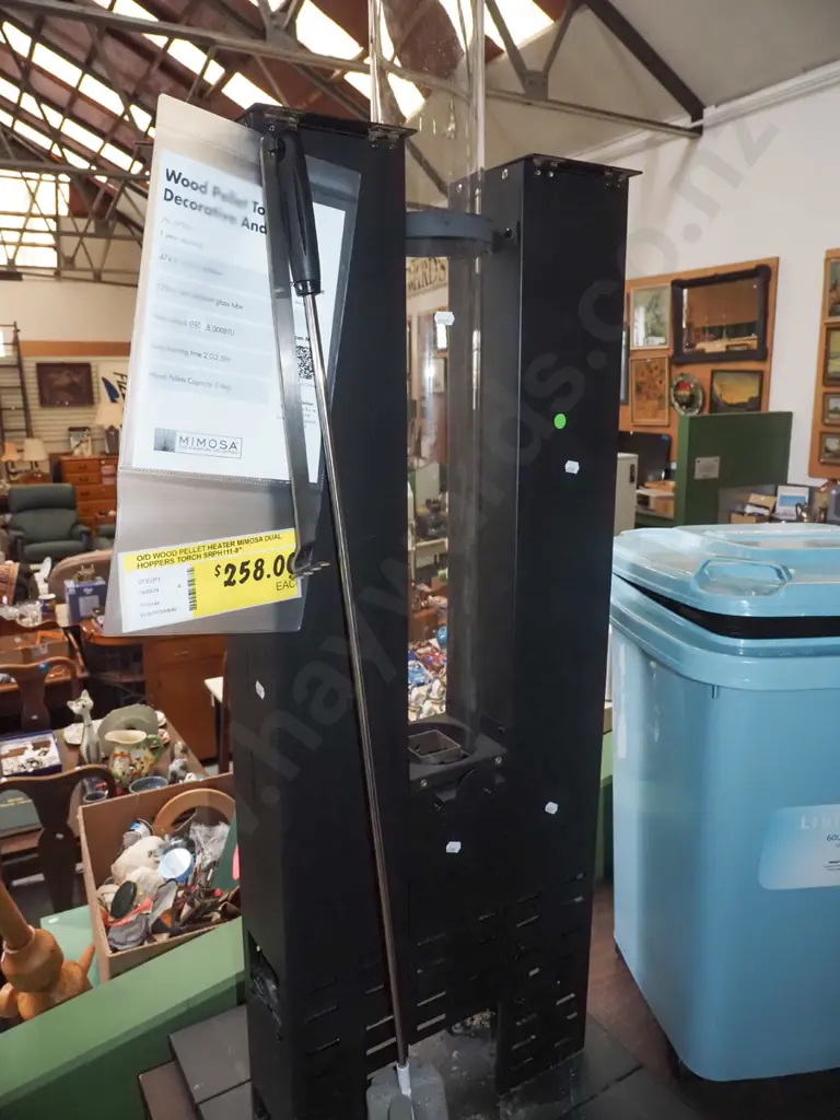 outdoor wood pellet fire with 60L wheelie bin part filled with pellets - blue dots Image 1++