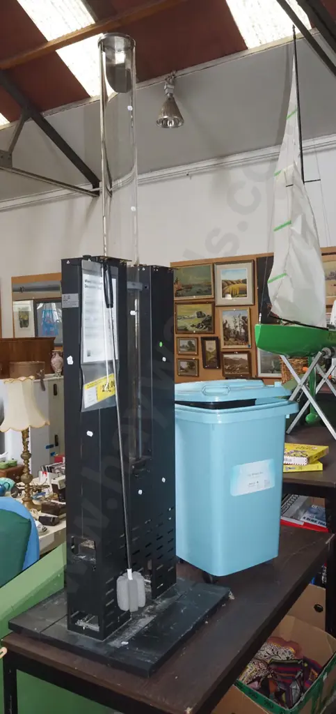 outdoor wood pellet fire with 60L wheelie bin part filled with pellets - blue dots Image 1++