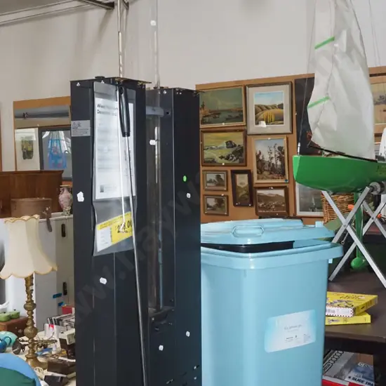 outdoor wood pellet fire with 60L wheelie bin part filled with pellets - blue dots