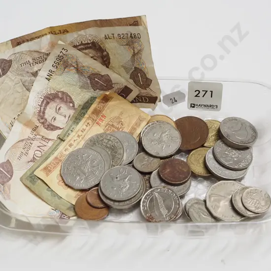 tray of bank notes and coins
