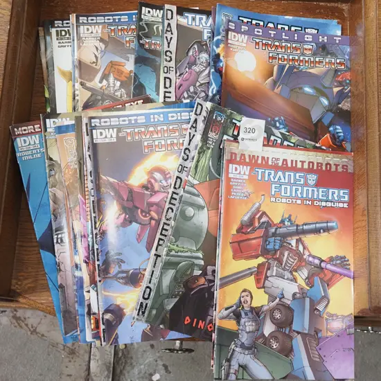 stack of Transformer comics
