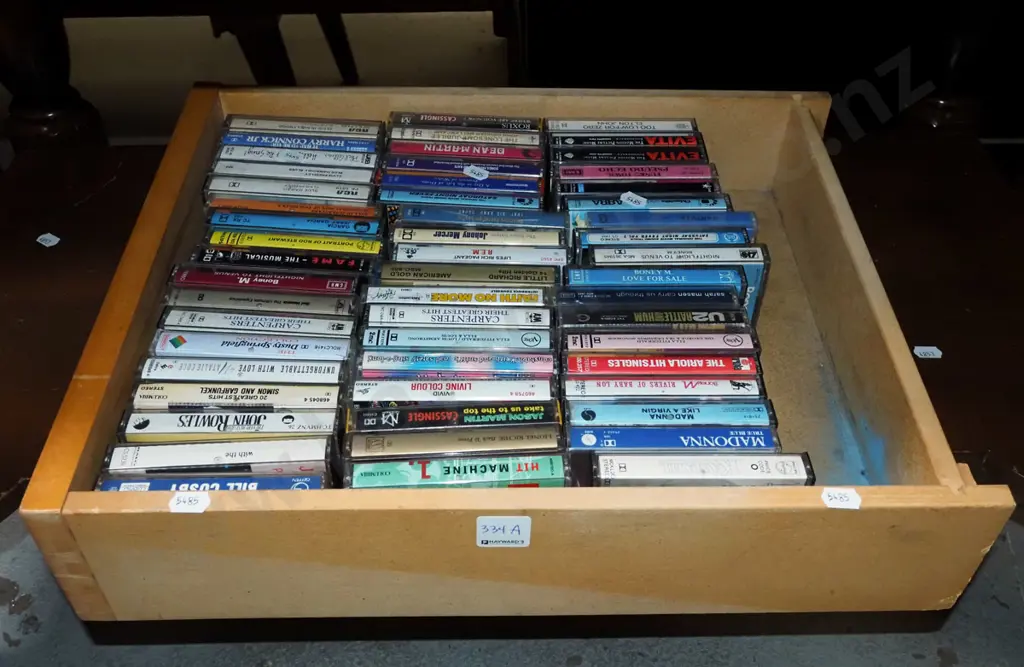 box of tape cassettes Image 1++