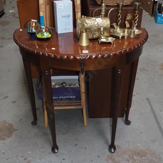 rope - edged half round hall table with drawer