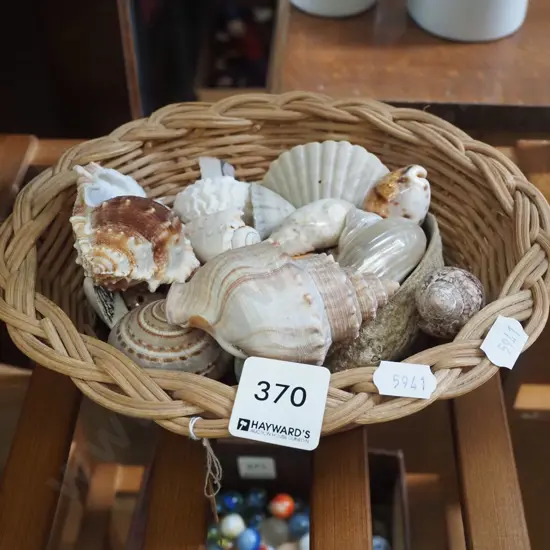 cane basket and seashells