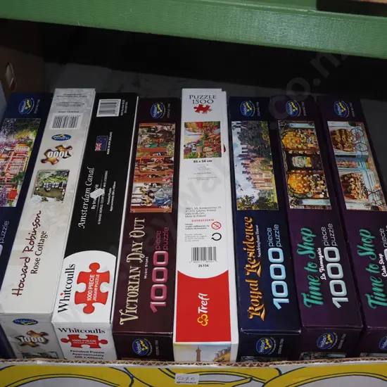 box of jigsaw puzzles