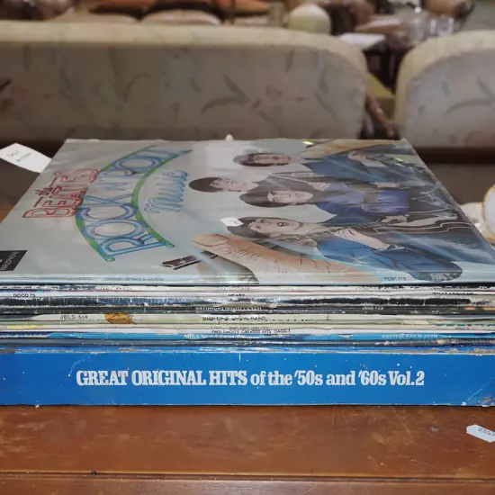 stack of LPs; Beatles, Cream etc