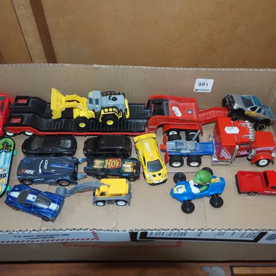 box of toy vehicles