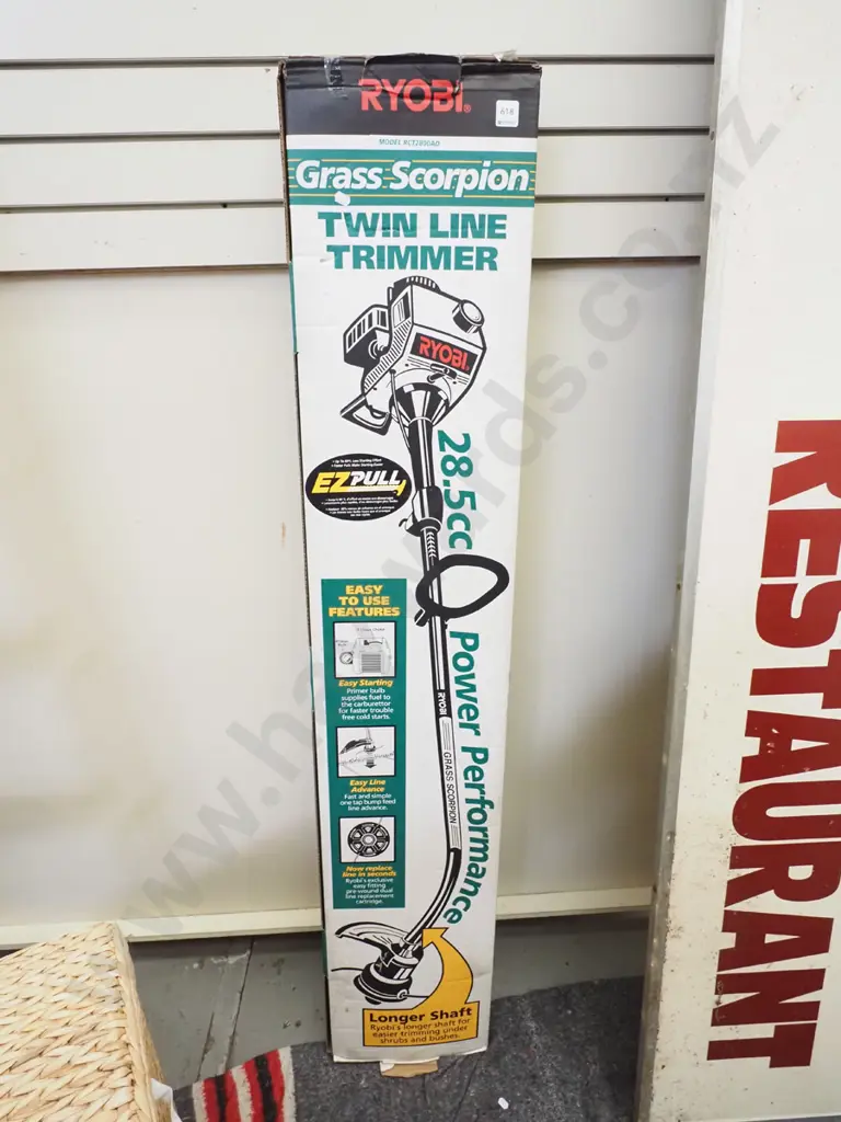 boxed Ryobi 2 stroke line trimmer Image 1++