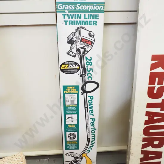 boxed Ryobi 2 stroke line trimmer