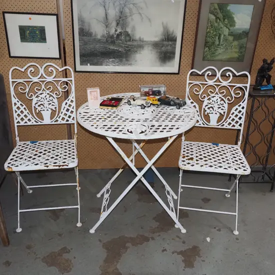 metal foldaway patio table with 2 chairs - rust to chairs