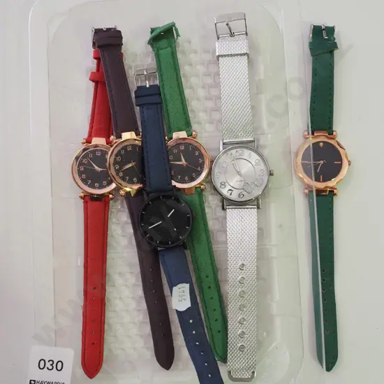 tray of wristwatches
