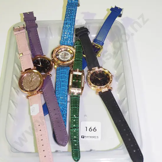 tray of wristwatches