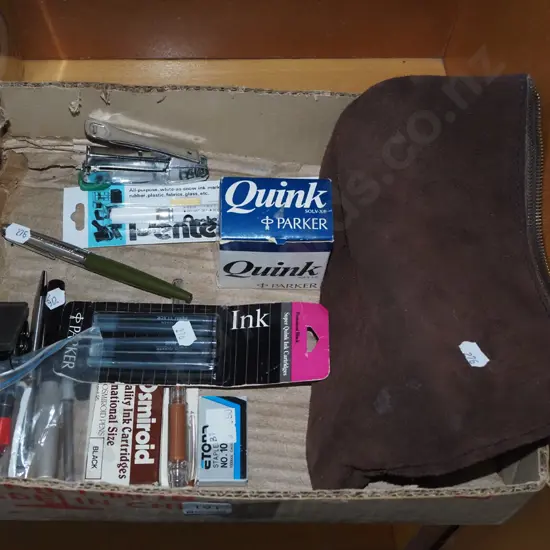 box; stationery items, ink, stapler, pens etc