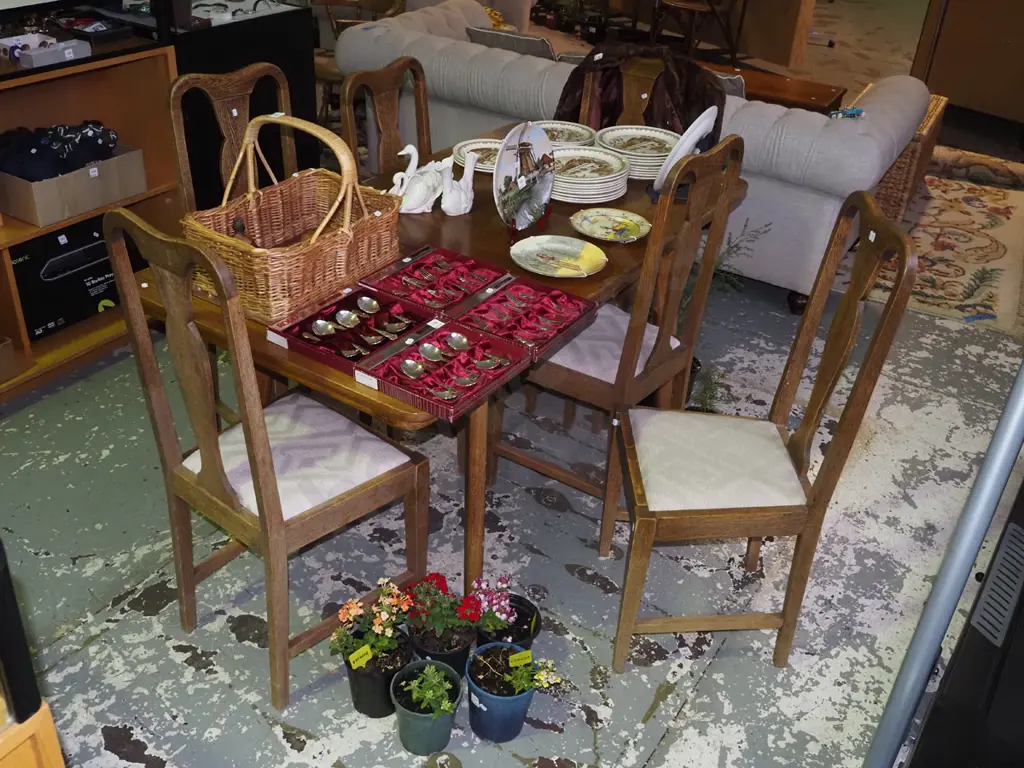 oak extending dining table, with 6 matching upholstered chairs Image 1++