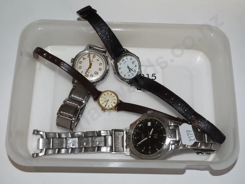tray of wristwatches Image 1++