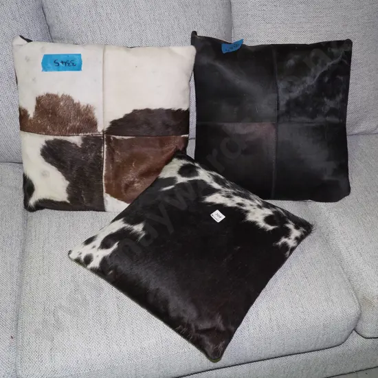 3x animal pelt cushions
