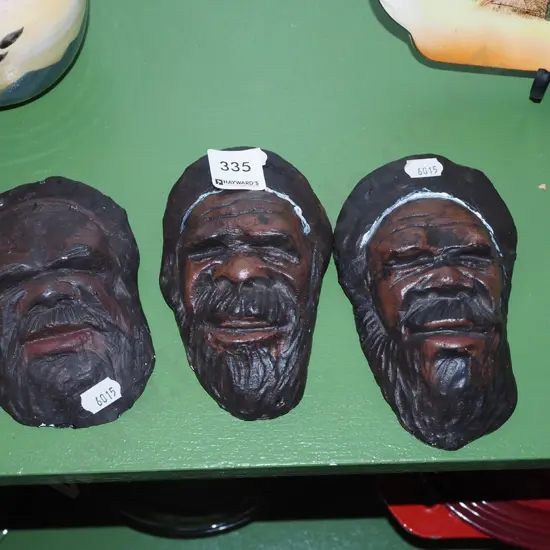 3x wall mounted faces