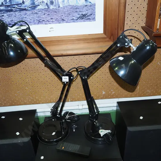 pair of black metal anglepoise bedside lamps