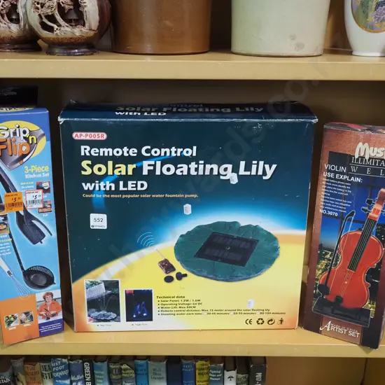 remote control solar power floating lily fountain pump, model violin, kitchen tool