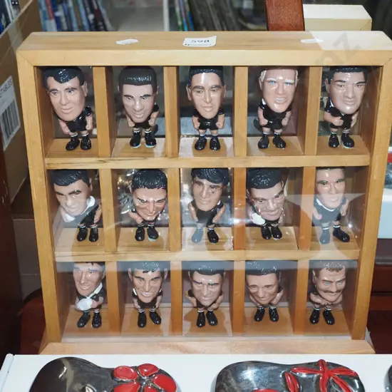 All Blacks figurines in wood and glass display case