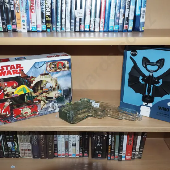 Lego star wars kit, glass pistol shaped bottle etc