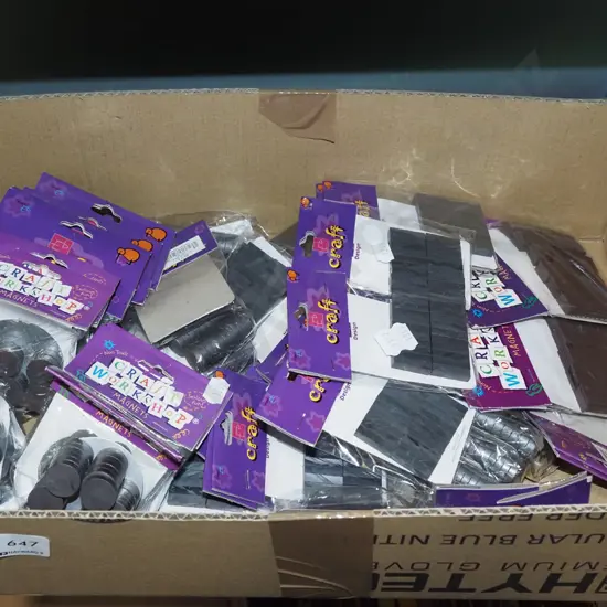 box of various craft magnets