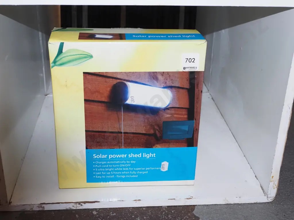 boxed as new old solar powered head light Image 1++