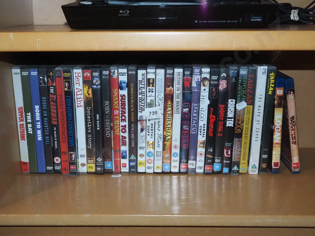 shelf of DVDs Image 1++