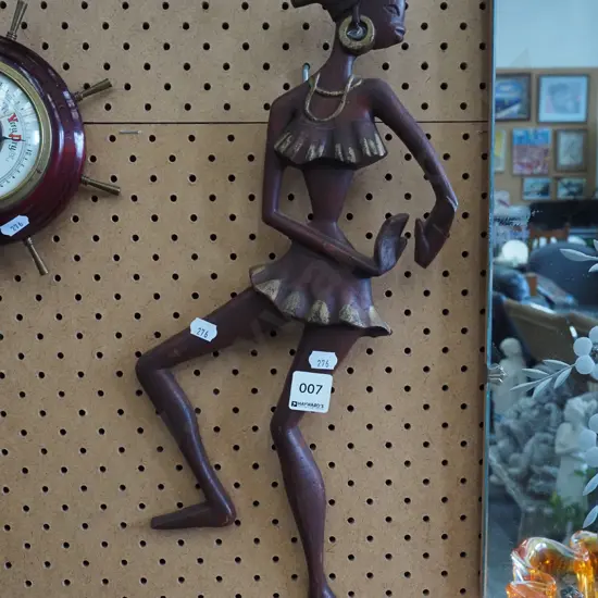 wall mounted dancing figurine