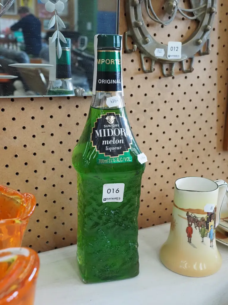 bottle of 700ml Midori Image 1++