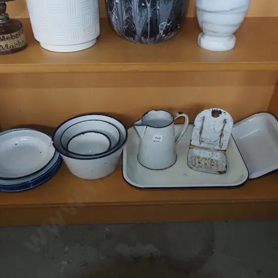 shelf of enamel ware; jug, bowls, dishes etc