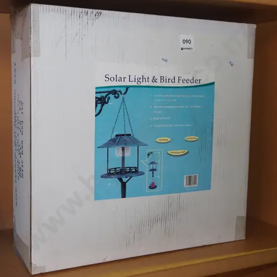 boxed as new solar light, bird feeder