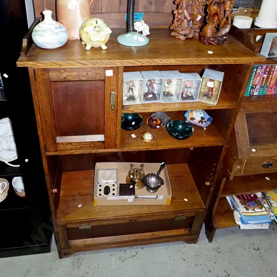 solid oak arts and craft bookcase wall unit with single cupboard door, adjustable shelf