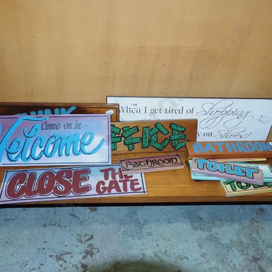 hand painted sign and 1 printed sign