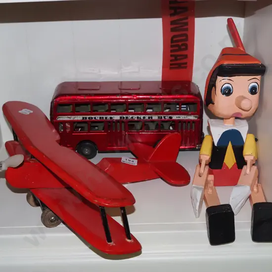 wooden plane, toy bus, Pinocchio