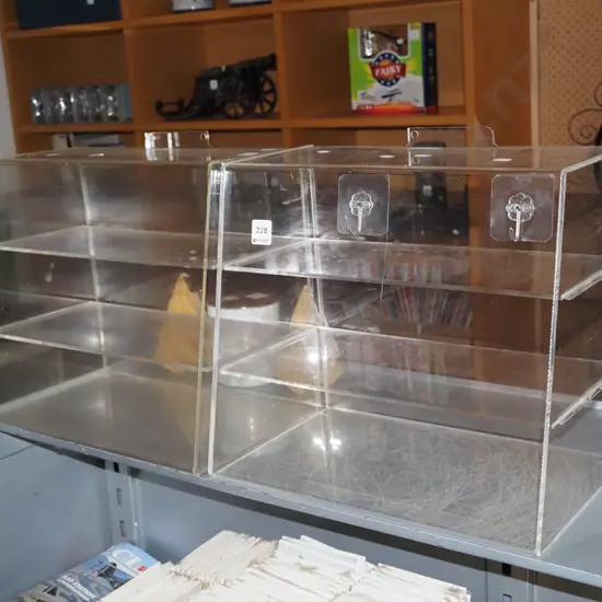 pair of perspex display shelves Each H330 W380 D225