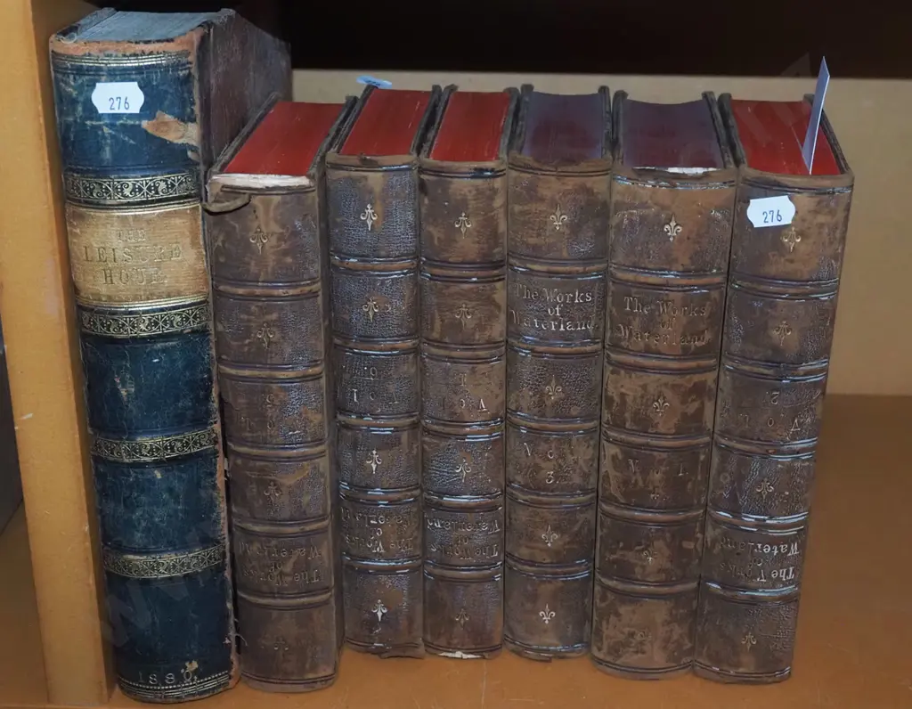 shelf of vintage leather bound books Image 1++