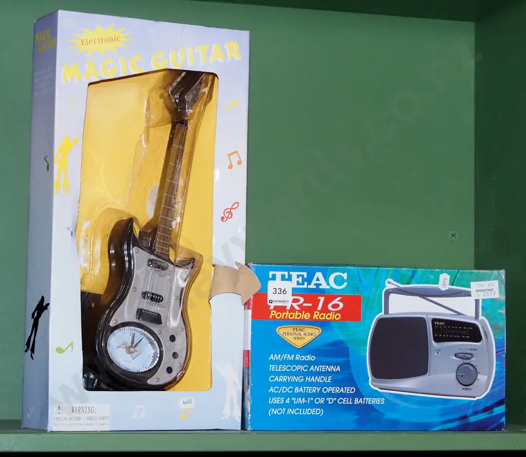 boxed as new guitar prop, portable radio Image 1++