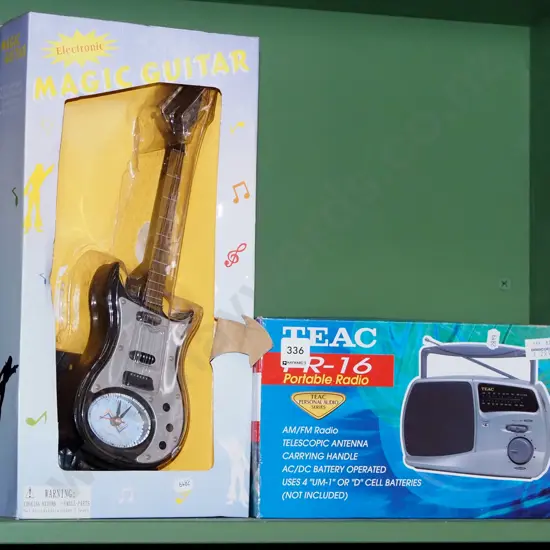 boxed as new guitar prop, portable radio
