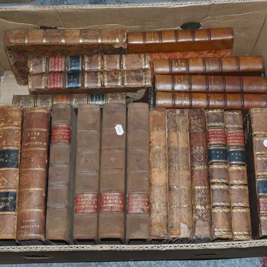 box of vintage leather bound books