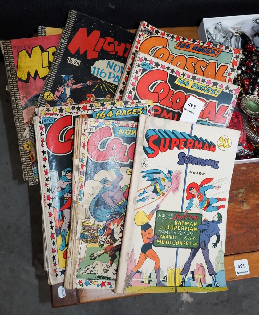 stack of Superman books Image 1++