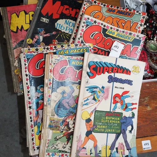 stack of Superman books
