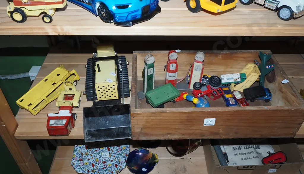 wooden box, toy vehicles, petrol pumps etc Image 1++